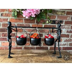 Martha Stewart skeleton with cauldron great for Halloween and trick-or-treaters